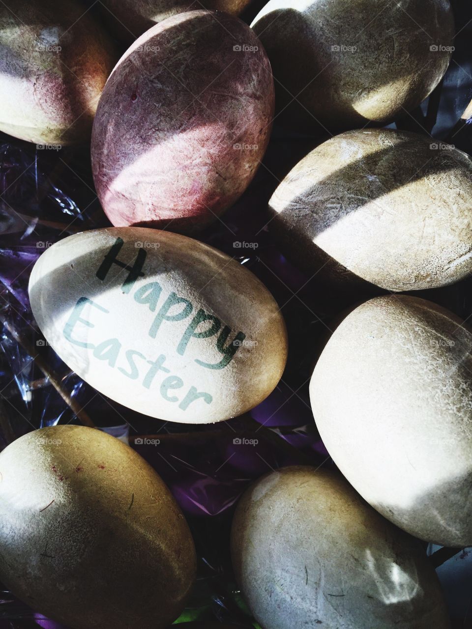 Easter eggs with text Happy Easter