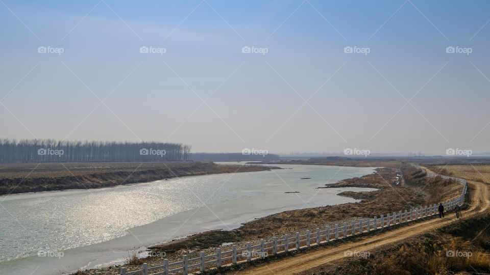 the ice on the river is melting