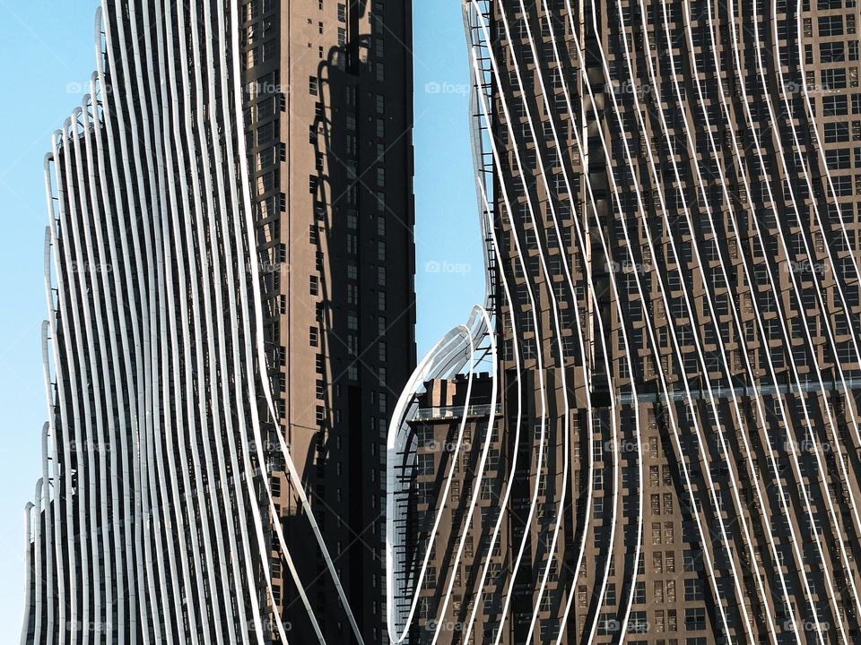 Detail close-up of highrise apartment facade during the morning light