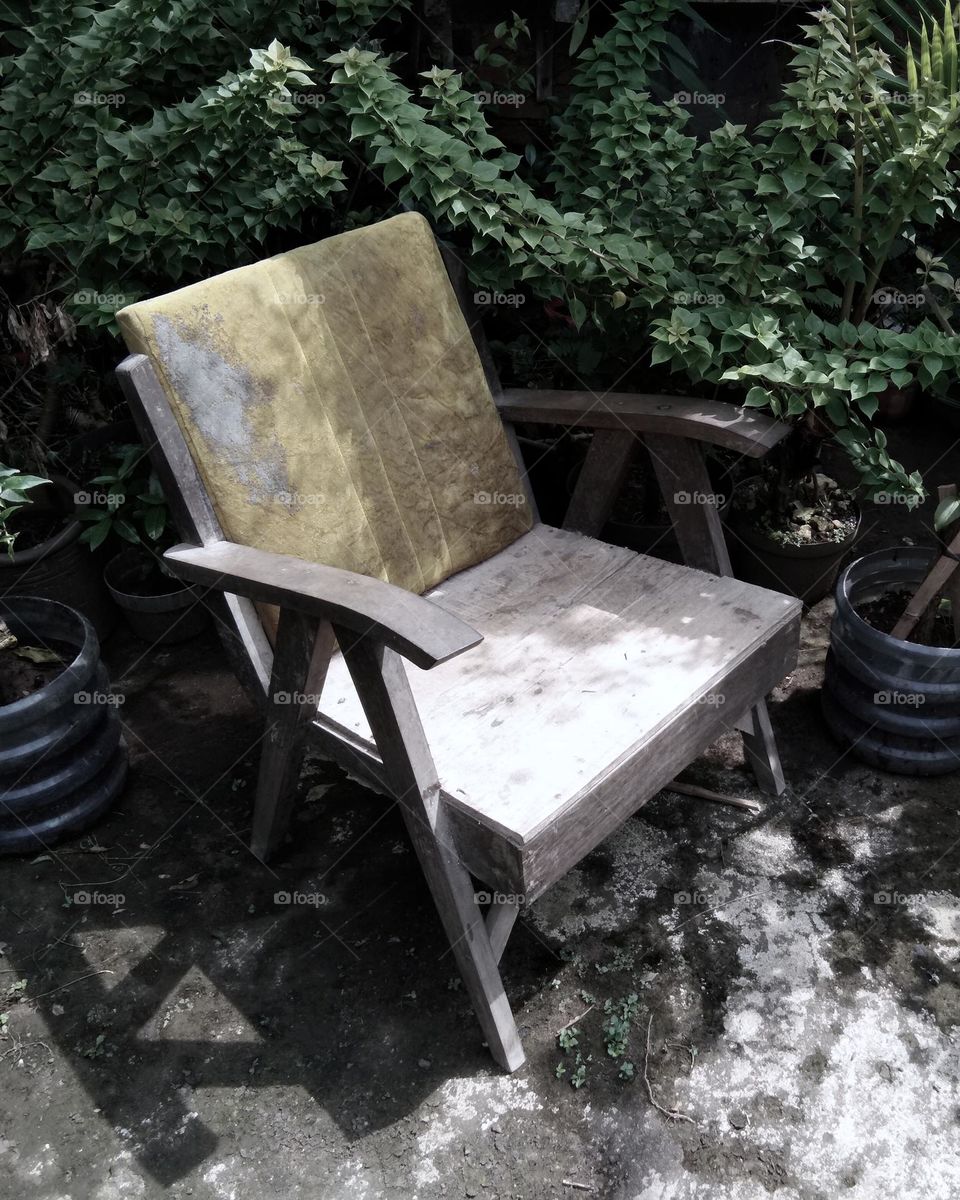 wooden chair at the garden