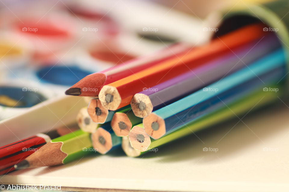 Pencils in symmetry