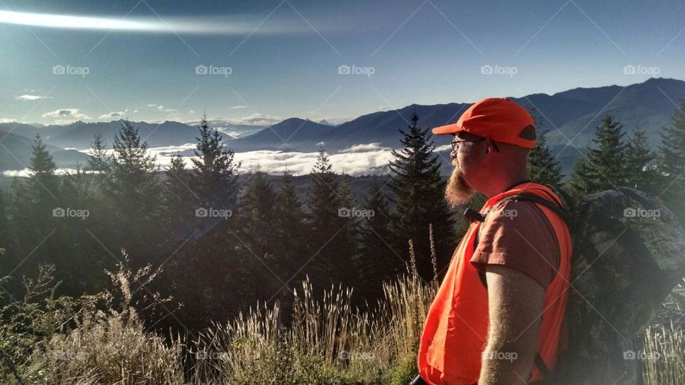 Hunter overlooking a valley