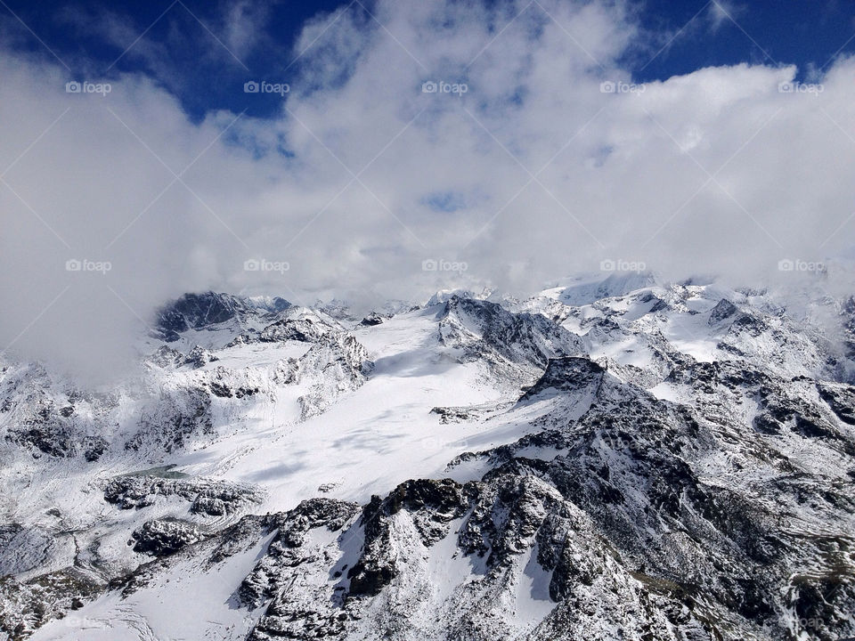 the clouds and glacier by swisstraveler