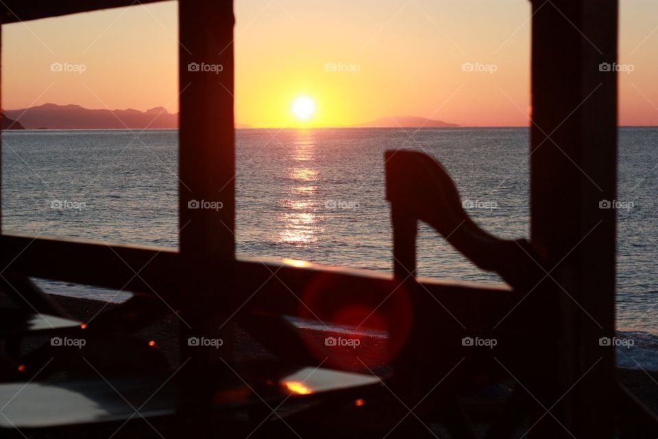 Caffe near the sea and sunset 