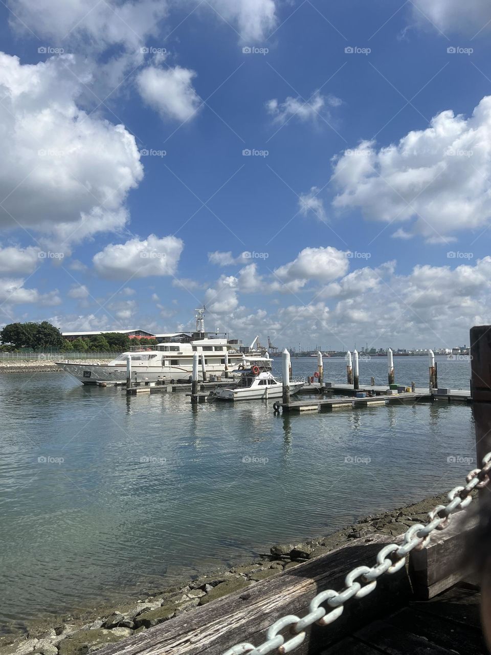 Yacht docking at the sunny island Singapore 
