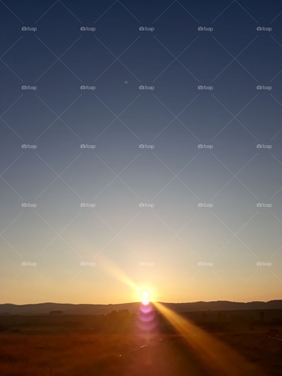 Infinite blue with sunset red