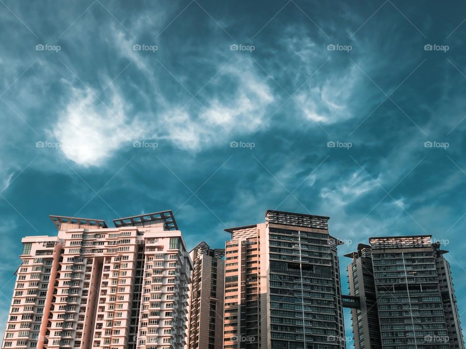 Morning clouds above highrise apartments in Kuala Lumpur, Malaysia