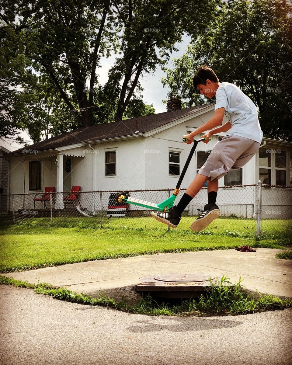 My little brother doing a double tail whip.