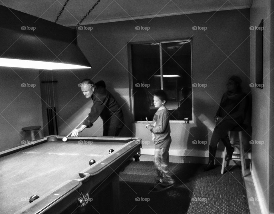 Boy Learning To Shoot Billiards