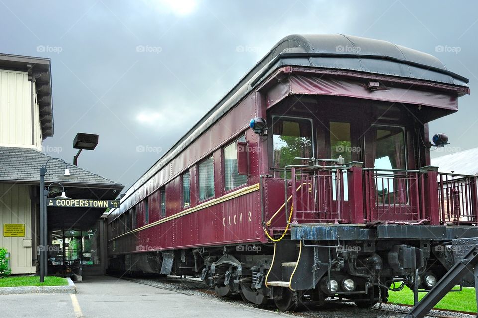 Cooperstown Train Station . Baseball hall of fame in Cooperstown, New York. The vintage train kept on the rails of the Cooperstown station. 