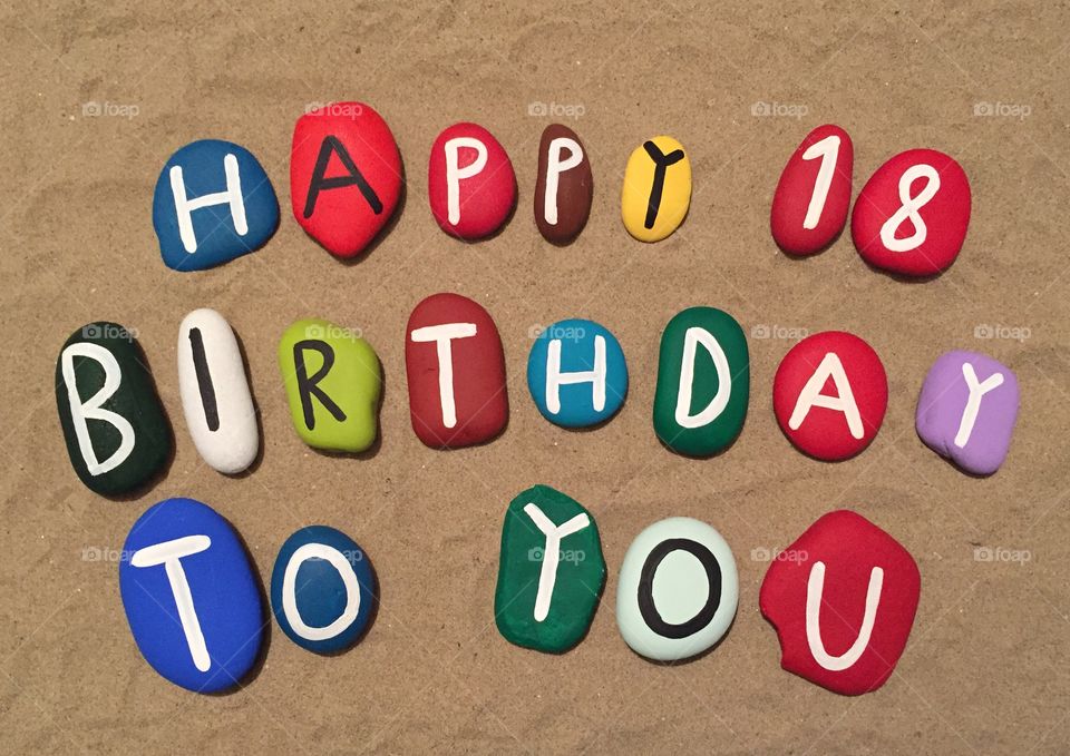Happy 18 years birthday on colored stones