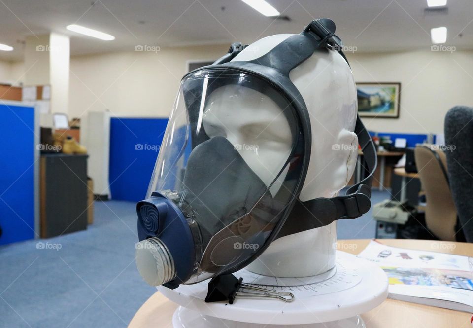 A gas mask or respirator is a health and safety device when working in a place full of toxic gases