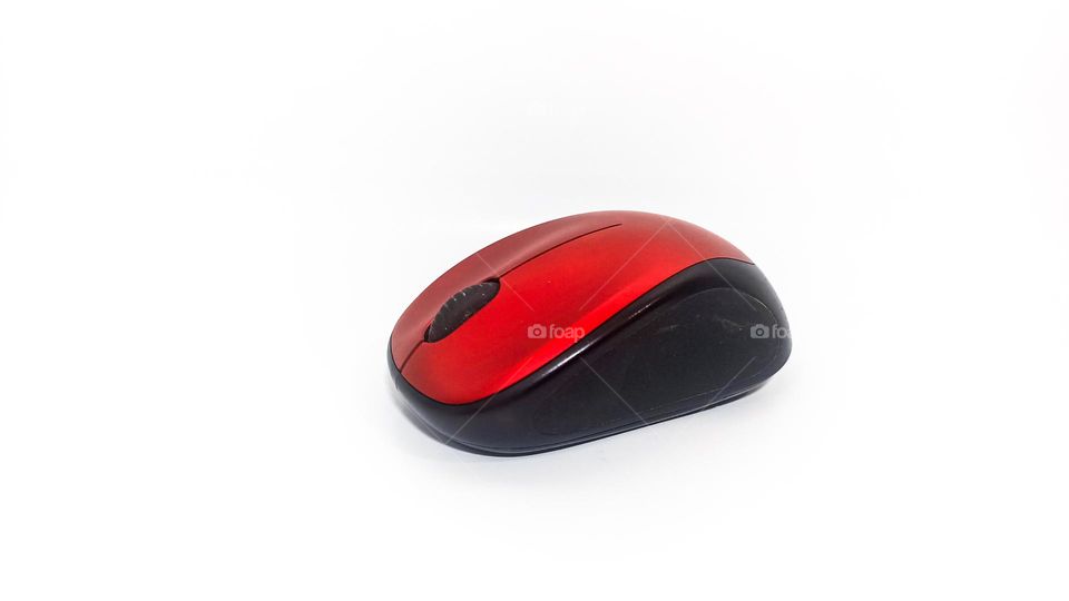 Red computer cursor moving mouse on white background isolated in eye level view