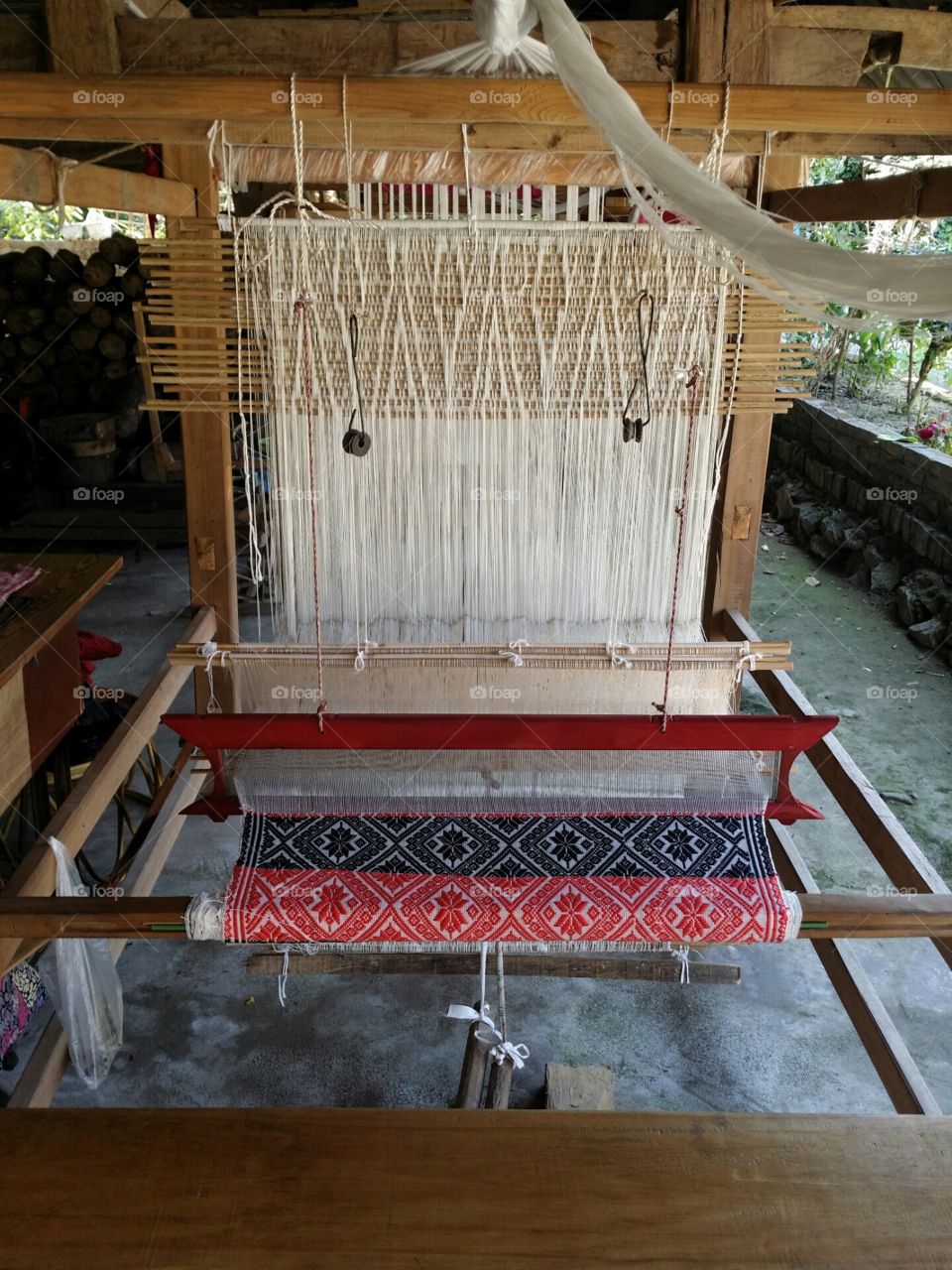 Dai ethnic fabric sarong wooden weaving loom Xishuangbanna Yunnan China
