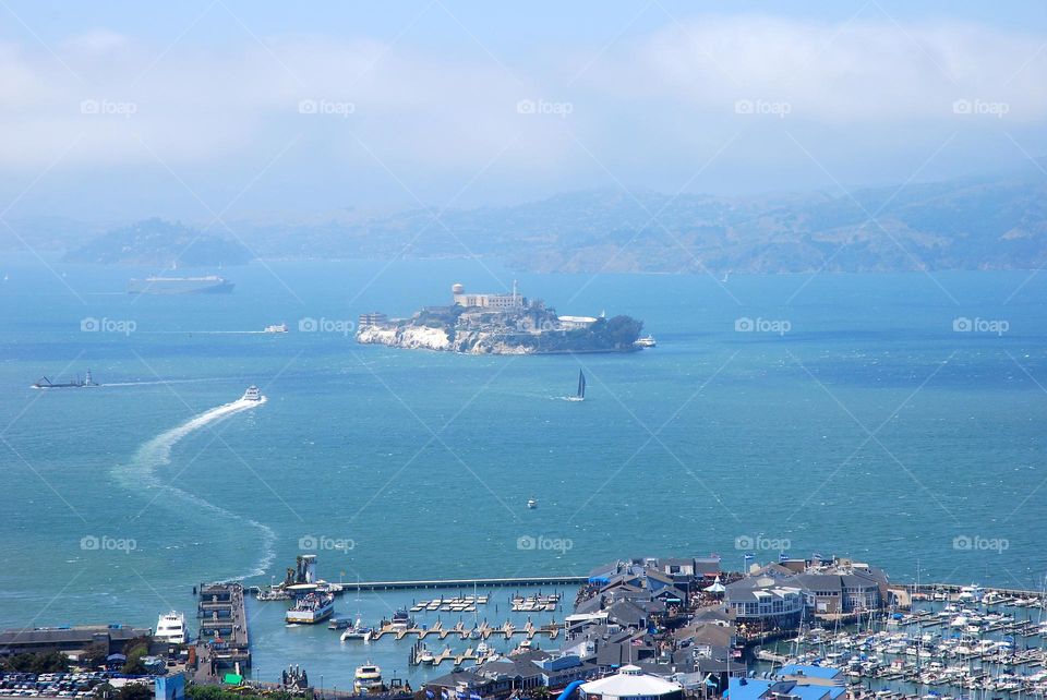 A misty San Francisco Bay with Alcatraz Island in distance