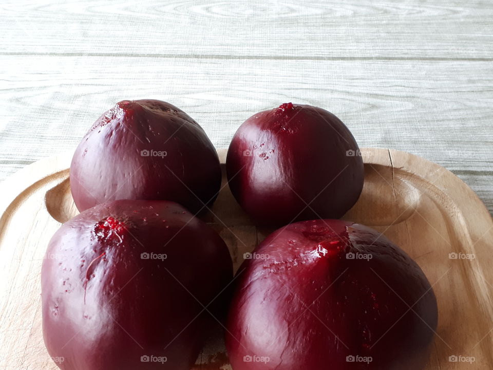 vibrant red beets against white.