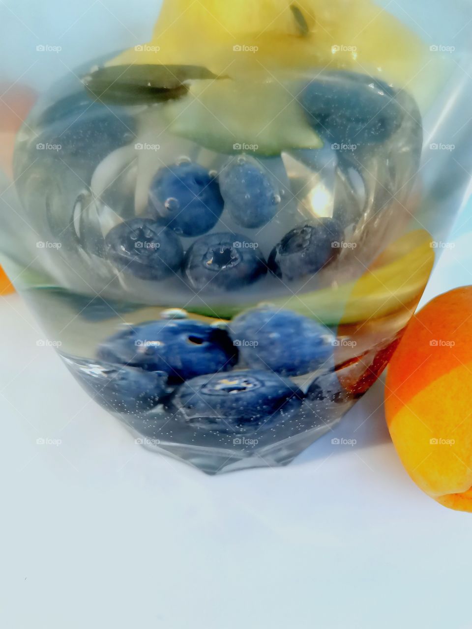 Reflection of berries in water