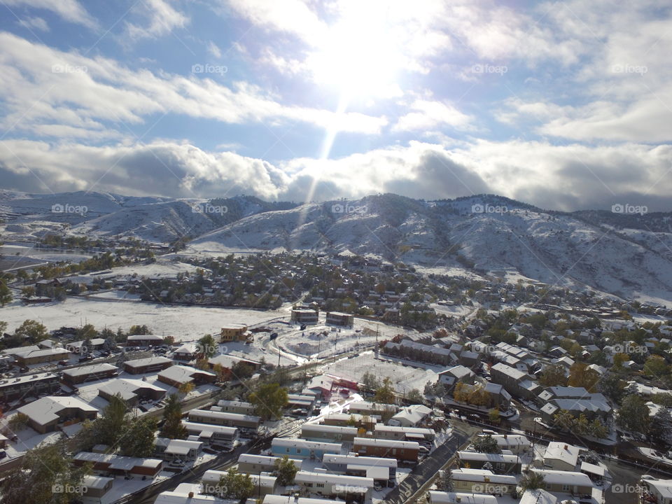 sun peeking out after snow storm from Drone