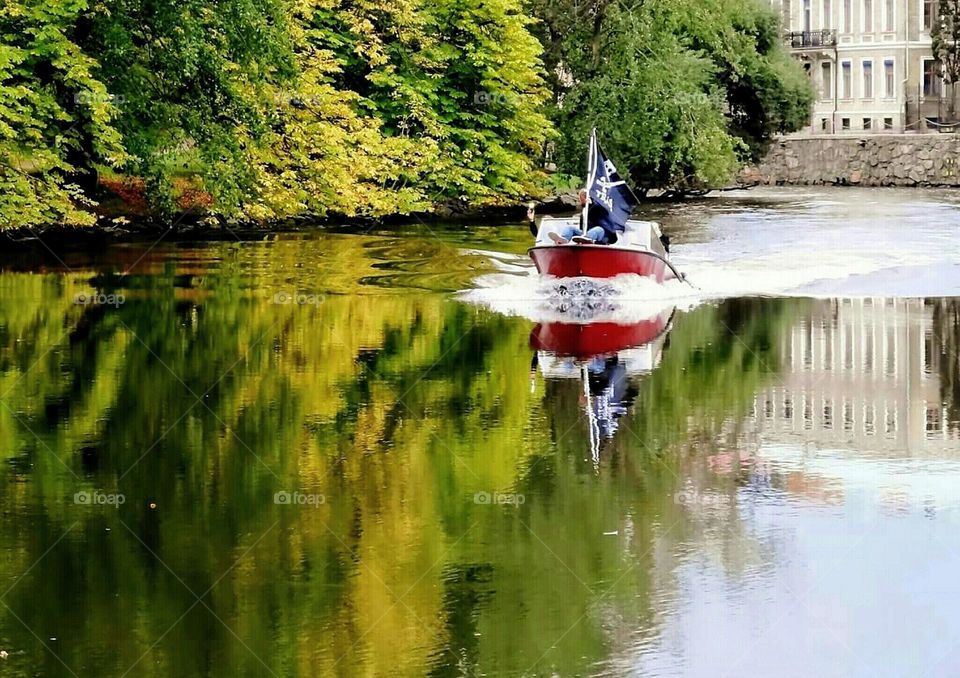 Red boat in the moat