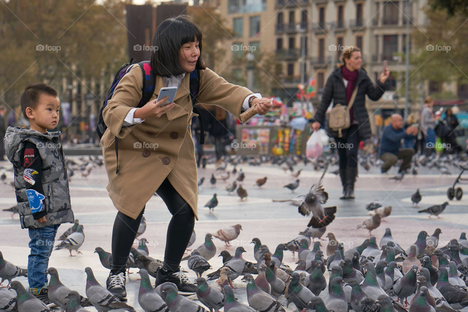 Mother, son and Pigeons 