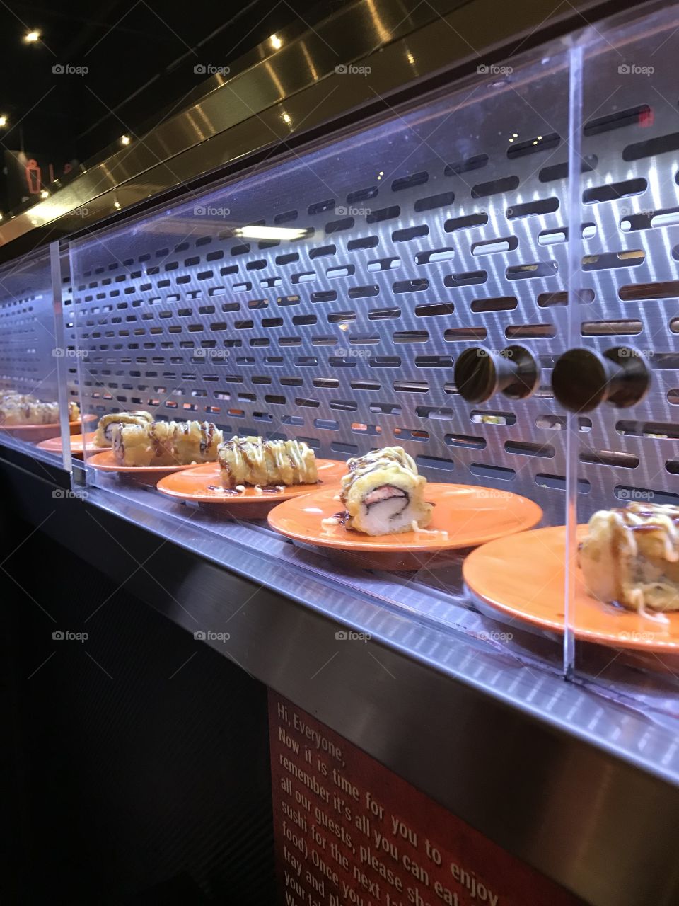 Fresh sushi on a sushi conveyor belt 