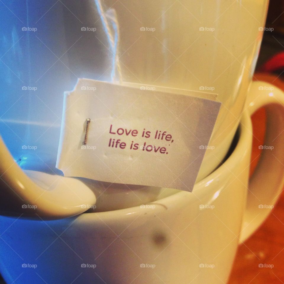 "Love is life Life is love" my morning tea has quotes 
