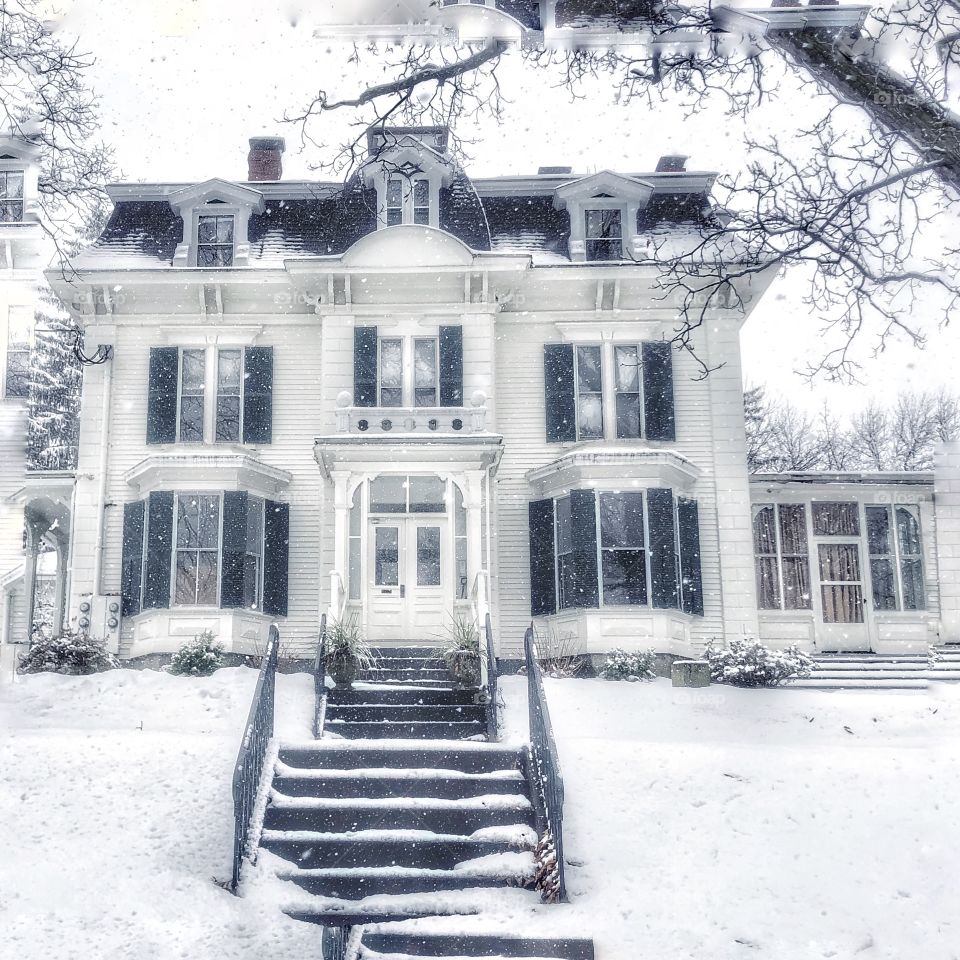 Large New England Style Home in the winter season 