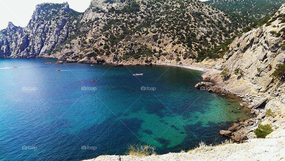 Enjoying the last summer days hiking in mountains above the sea 