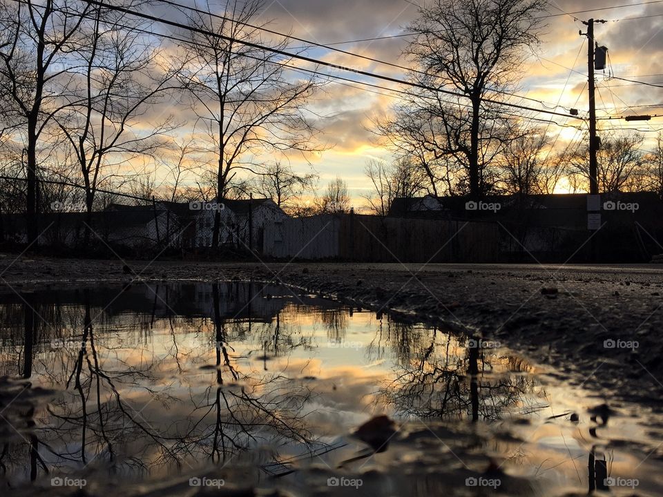 Sunset puddle reflection 