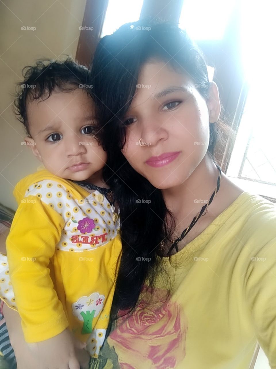 baby with mother