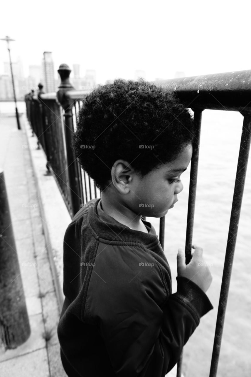 My son watching the waves 