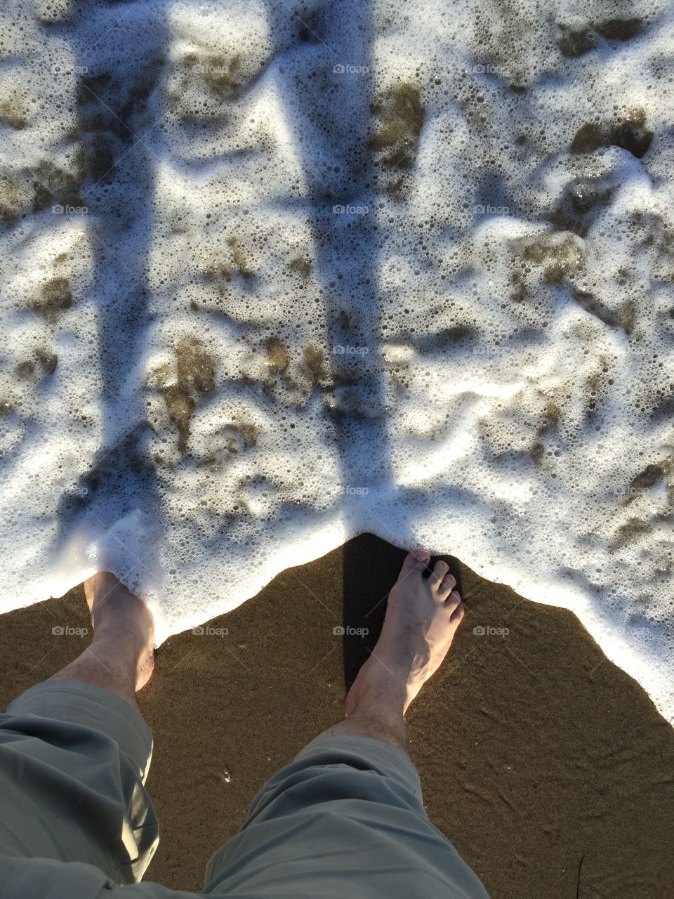 Bare feet in the Pacific Ocean for the first time. Malibu, California. 