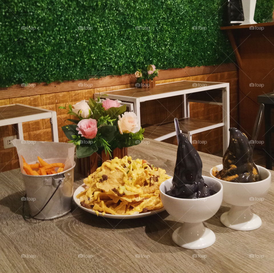 Cheesy fries, Nachos overload, Black ice cream. Nothing bits good food to share with good people.