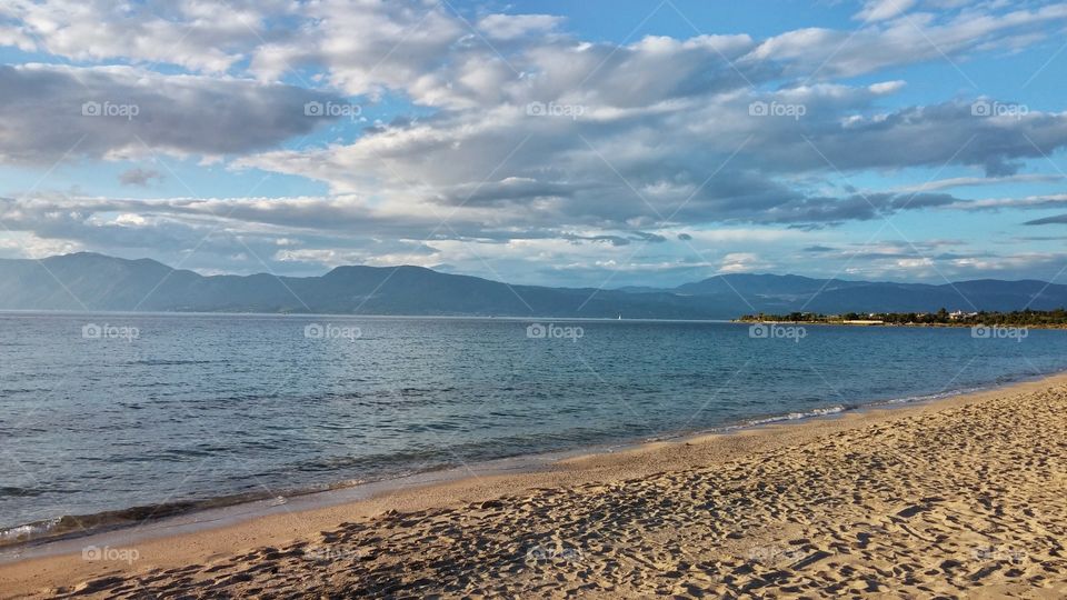 Cloudy sky against blue sky