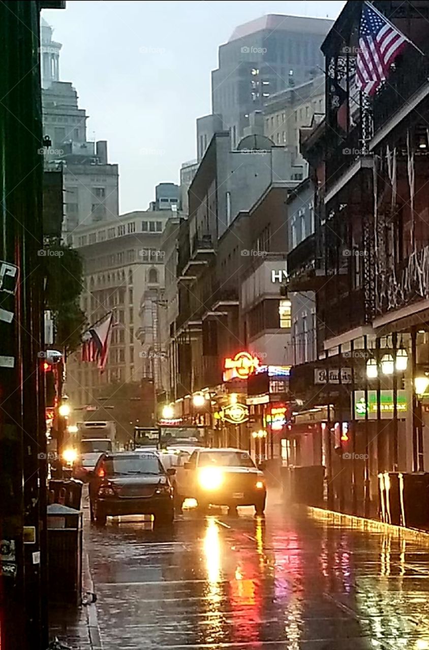 The street in New Orleans is lit up with morning lights