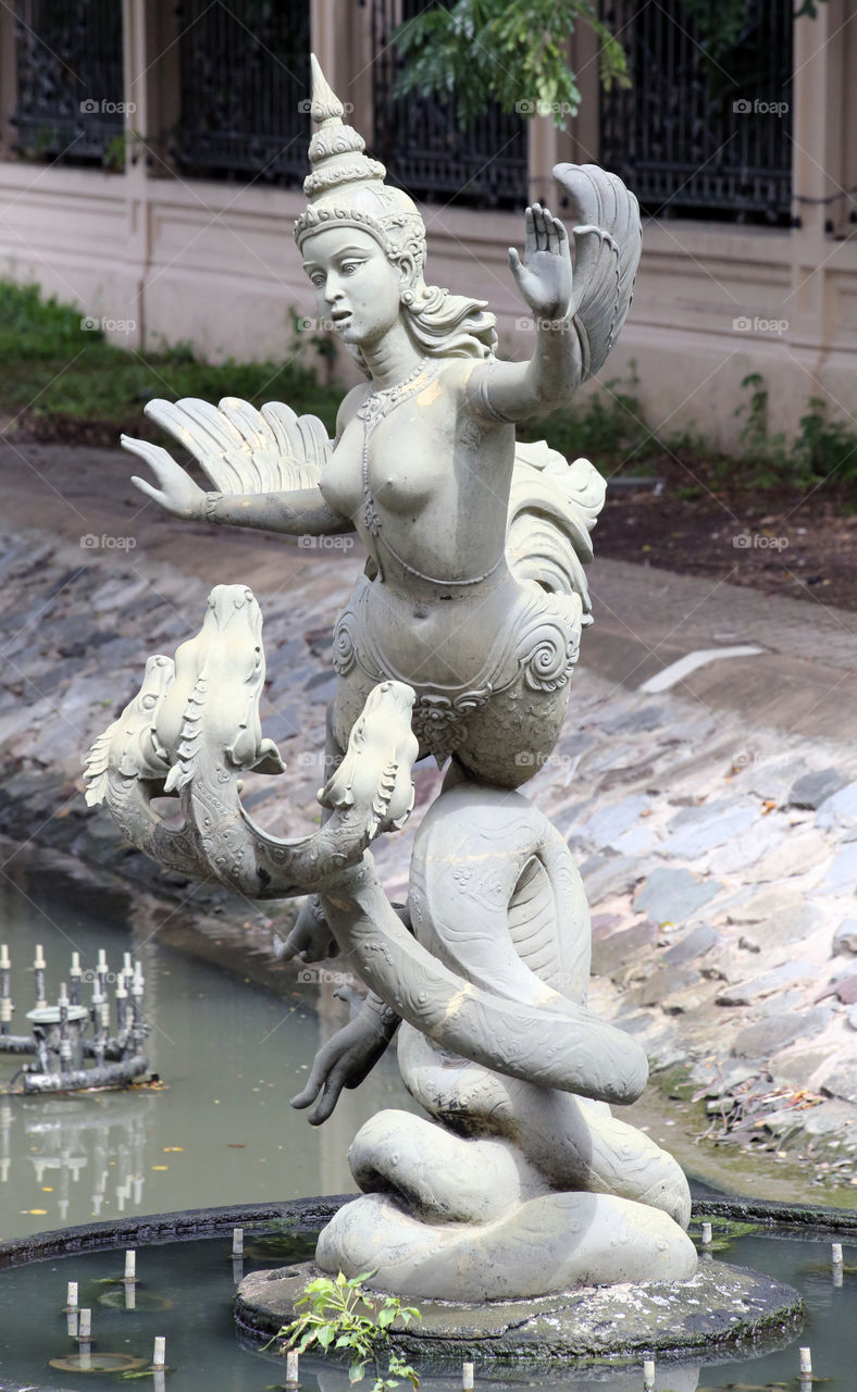 Flying Goddess. One of the many statues to the gods and goddesses of Thailand. This one is close to the royal residence