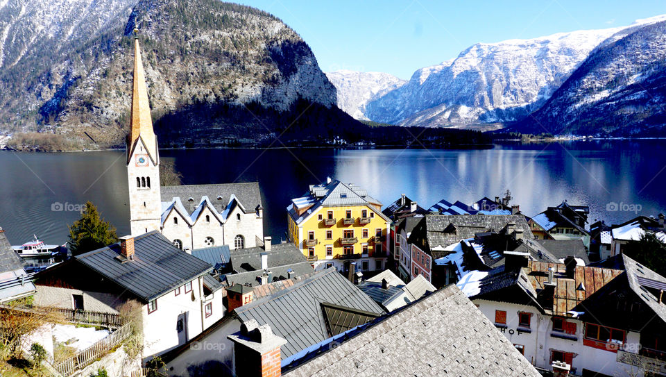 Scenery of Hallstatt lake and snow mountains, Austria 
