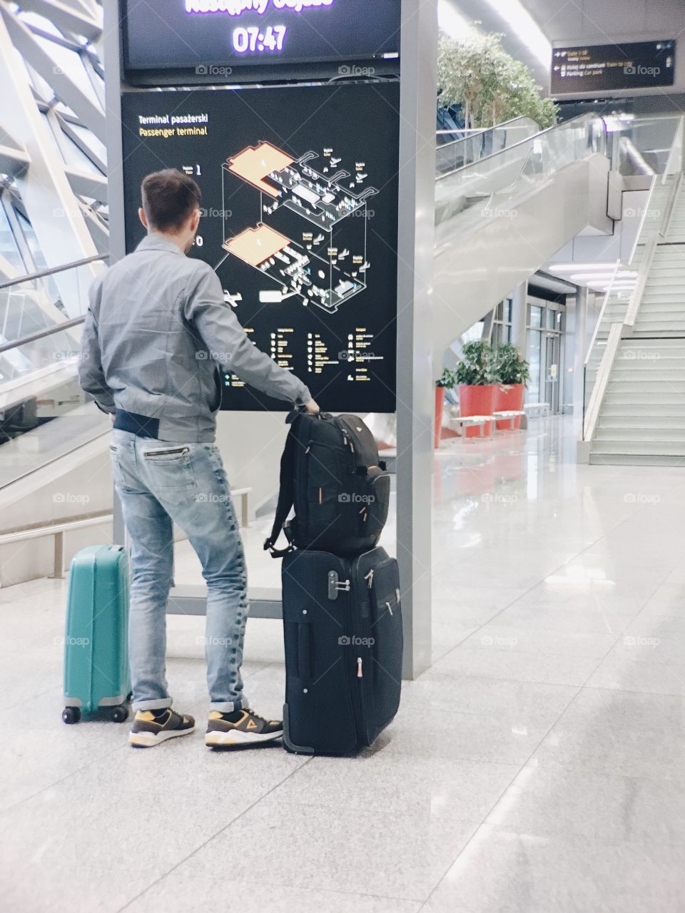 Man with luggage at the airport