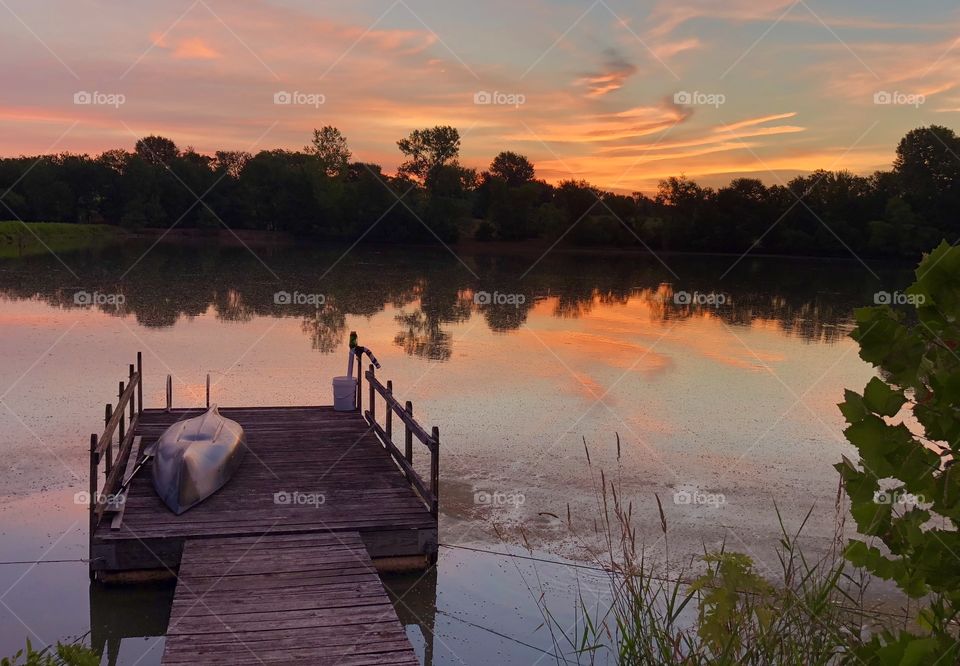 Sunrise Over Holiday Lake, Holiday Lake, Sunrise, sunrise, lake, kayaking, kayak, dock, wood, wooden, floating, water, clouds, reflection, cloudscape, summer, vacation, scenic, grass, trees, light, beautiful, quiet, calm, serene, sky, pond, Missouri 