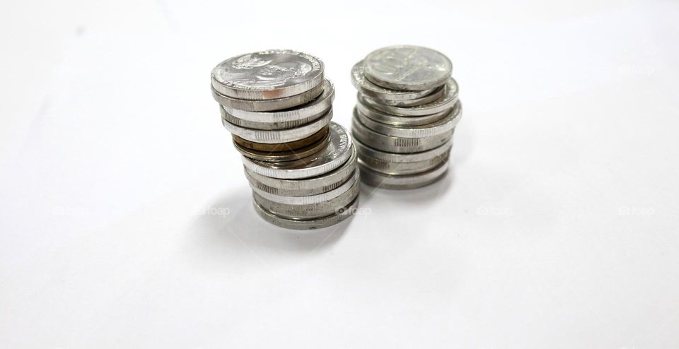 Coins are part of the medium of exchange in economics and business