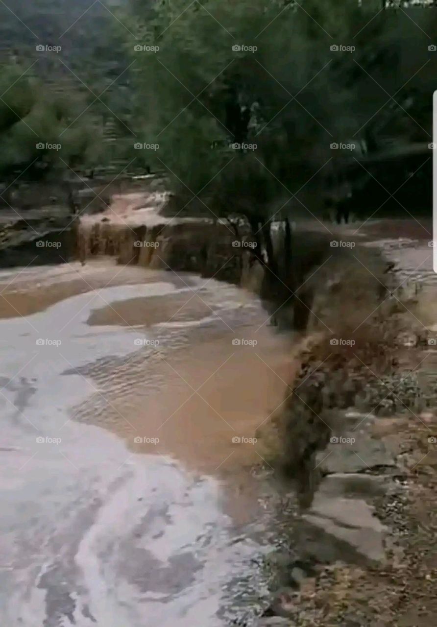 Glory be to God, the magnificent and picturesque view and the natural green trees are a view that is nothing more wonderful than it