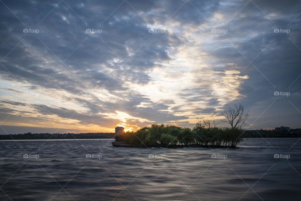 Clouds over White lake at dusk