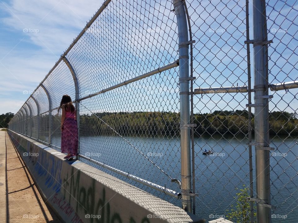 long walk on side of bridge