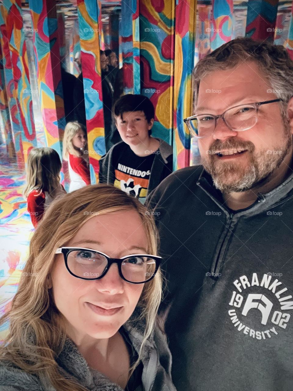 A family exploring an art exhibit together in Denver Colorado 