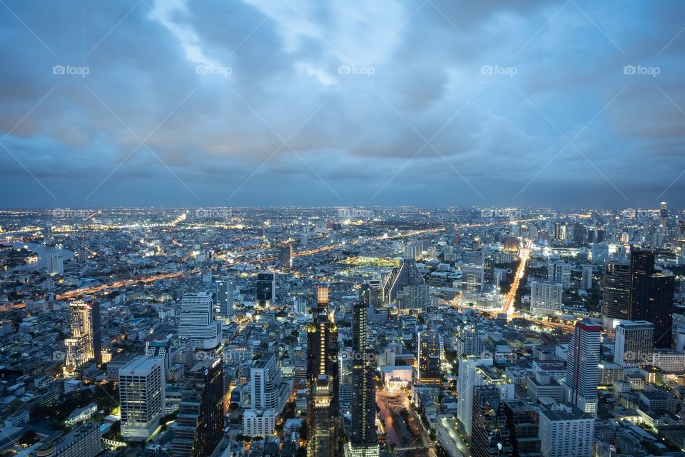 Night view of big city , Bangkok Thailand from king power mahanakhon roof top skywalk , a new traveling place for photography