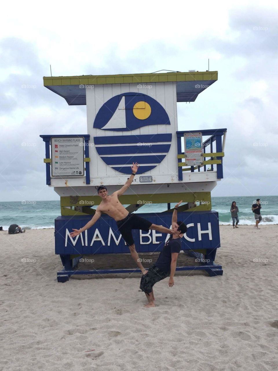 Two male friends enjoying at Miami beach