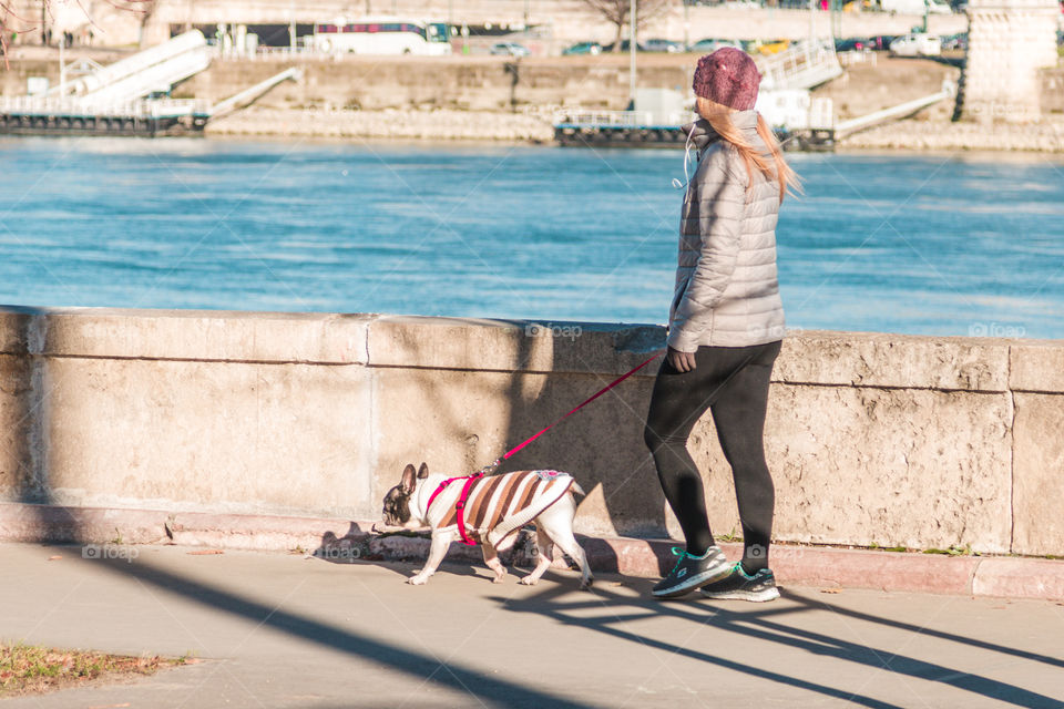 Young Girl With Her Dog Outside
