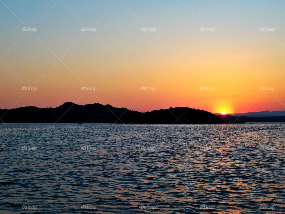 Amazing sunset photo taken from a small boat