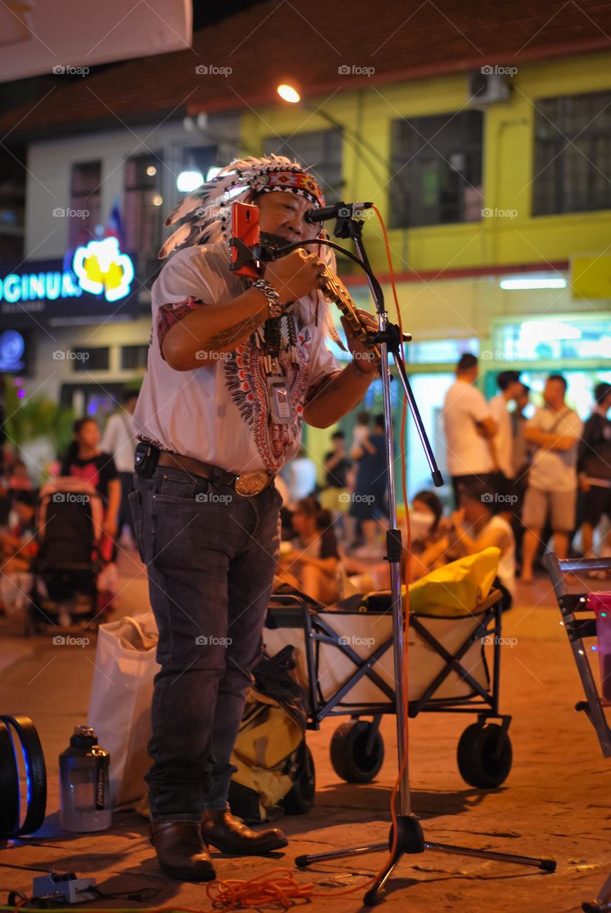 Pan Flute busker at Gaya Street Kota Kinabalu