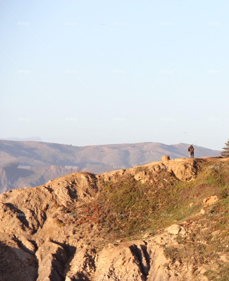 Mountain landscape with tourists 